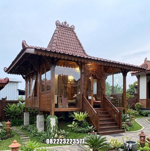 Rumah Kayu Kombinasi Kaca Model Minimalis Klasik